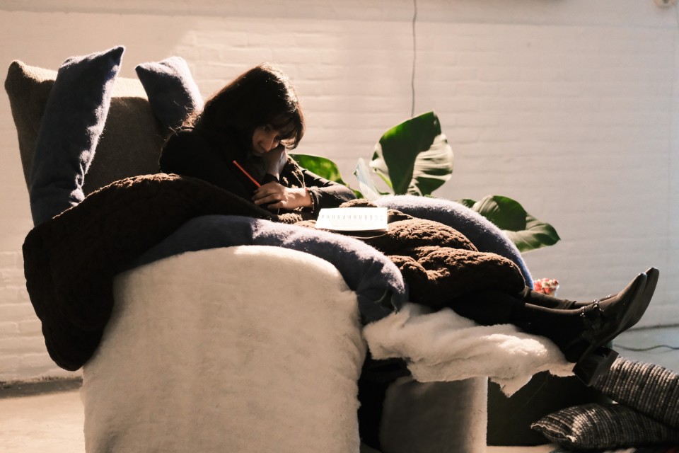 take a seat - visitor writing on cushions