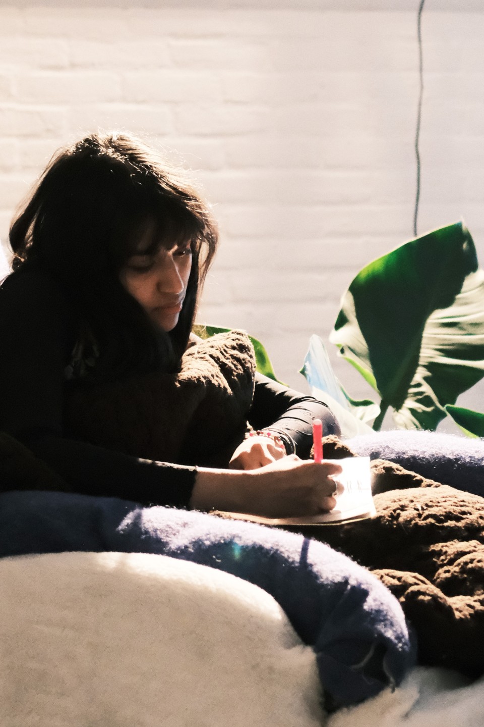 take a seat - visitor writing close-up